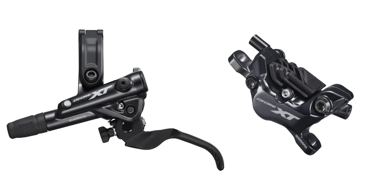Гальмо гідравл. дискове Shimano M8120 DEORE XT переднє (ліва ручка, 4-поршн каліпер, J-kit гідролінія 1000мм)